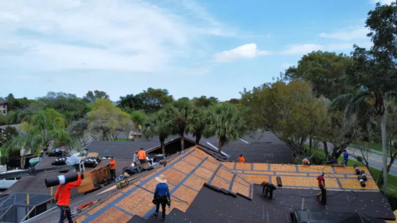 Residential roofing services for tile and flat roofing systems in South Florida