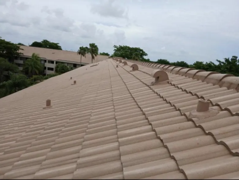 Tile to flat roof transition detail on a residential roof