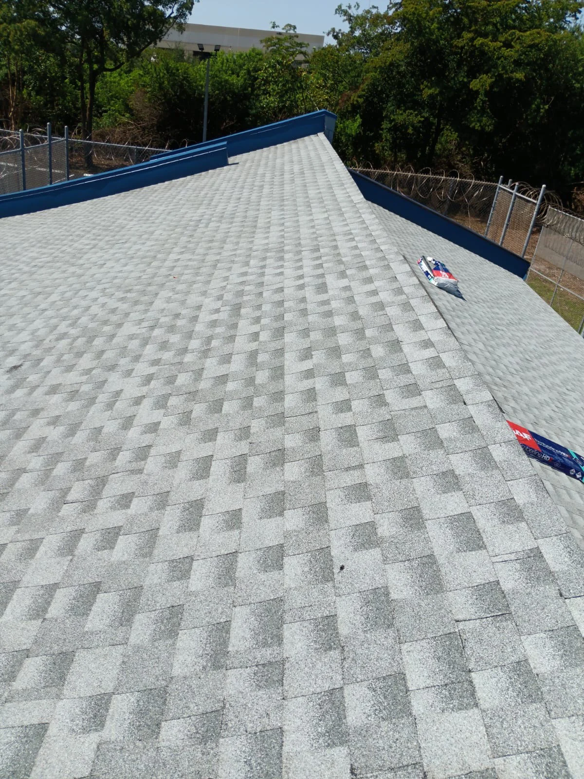 Shingle roof repair on a residential home in South Florida
